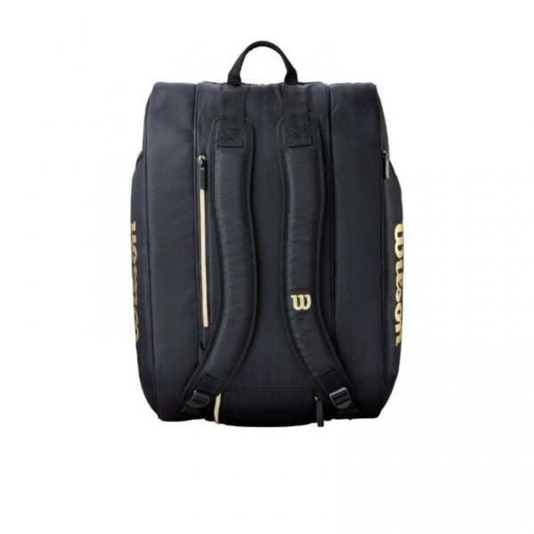 paletero-wilson-defy-v1-negro-dorado-es-1-1100×1100-1.jpg