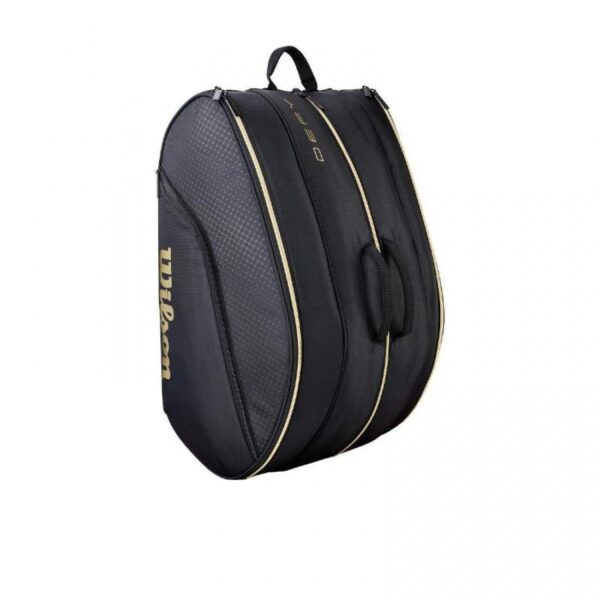 paletero-wilson-defy-v1-negro-dorado-es-3-1100×1100-2.jpg