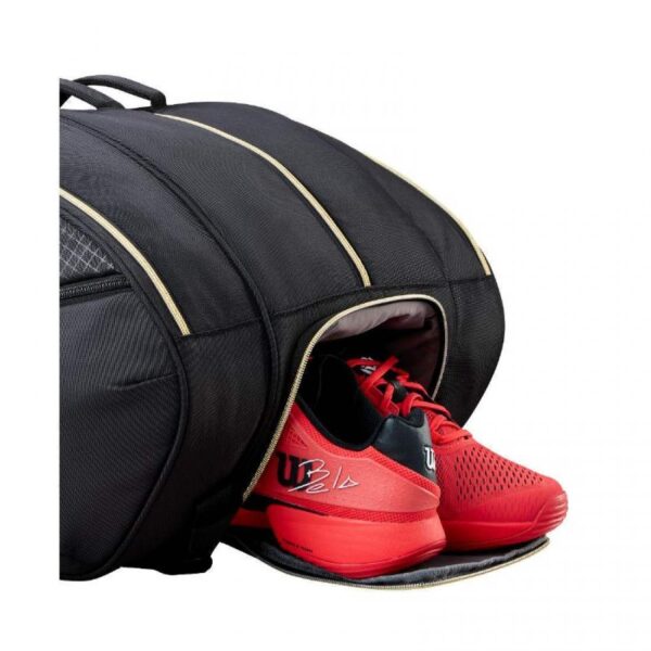 paletero-wilson-defy-v1-negro-dorado-es-6-1100×1100-2.jpg